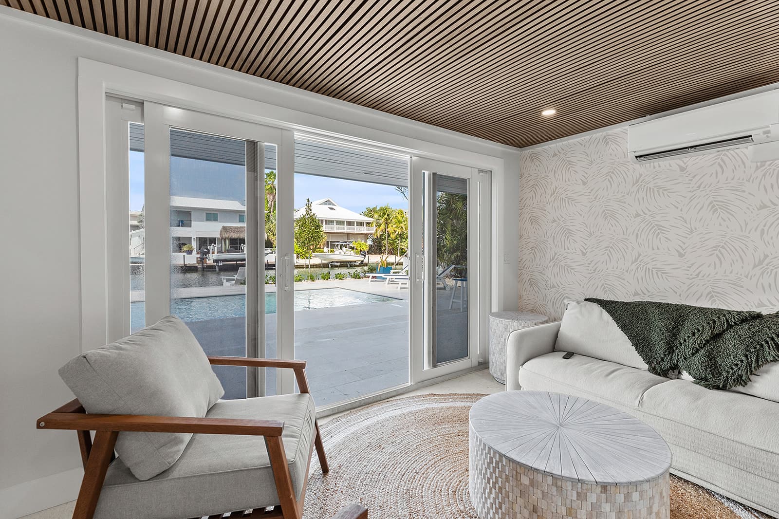 Bathroom, bedroom, and window with water view