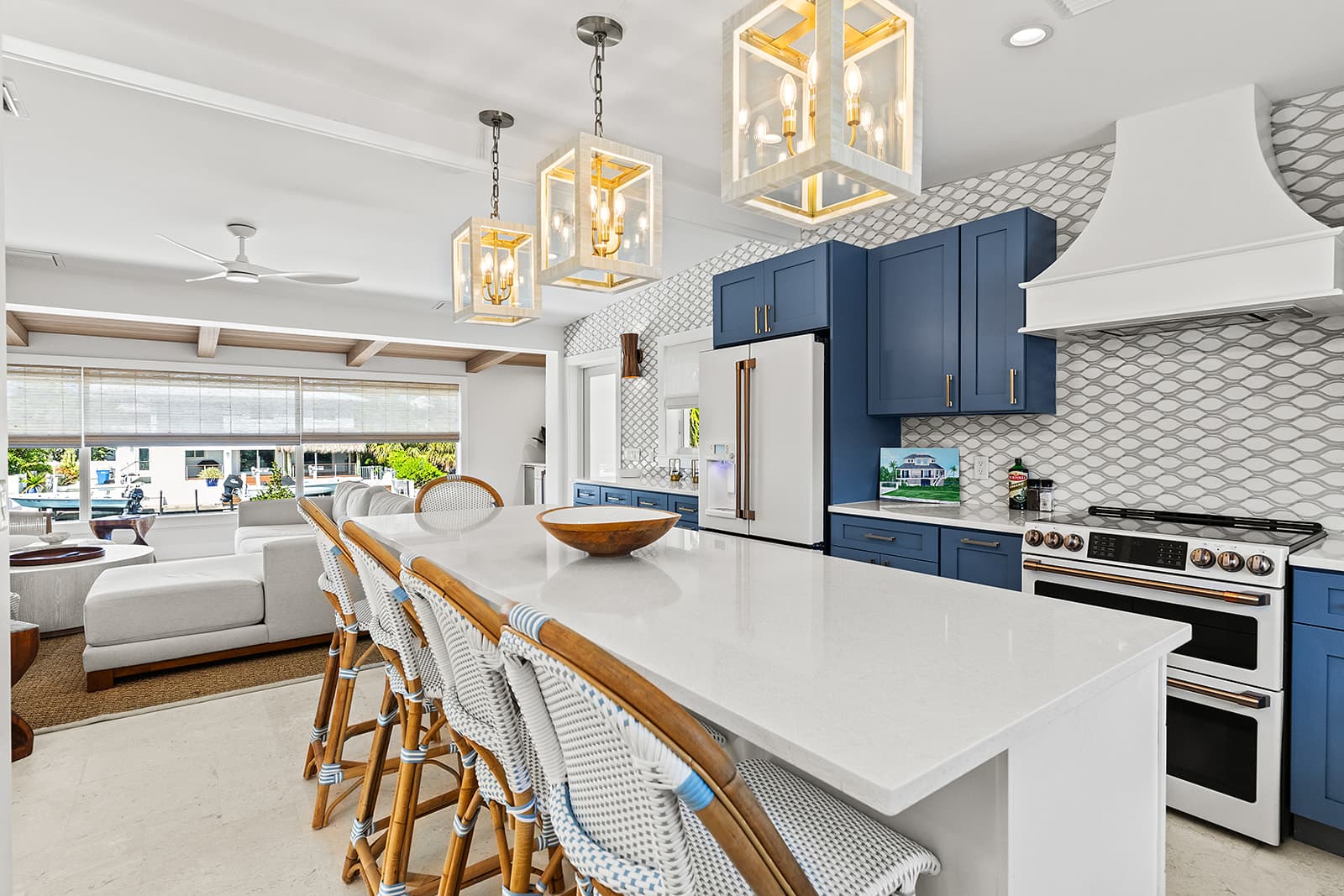 Kitchen and living room with blue cabinetry